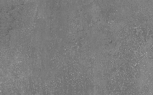 Obklad v šedé barvě v betonovém designu o rozměru 24,8x39,8 cm a tloušťce 7,5 mm s matným povrchem. Vhodné pouze do interiéru. S velkými a nahodilými odchylkami v odstínu barev, struktury povrchu a kresby.