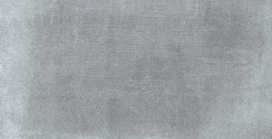 Rektifikovaný obklad v šedé barvě v betonovém designu o rozměru 29,8x59,8 cm a tloušťce 10 mm s matným povrchem. Vhodné pouze do interiéru. S velkými rozdíly v odstínu barev, struktury povrchu a kresby. Made by RAKO.