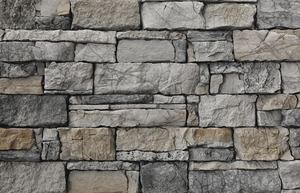 Kamenný obklad z betonu svým vzhledem a strukturou věrně imituje přírodní kámen v šedé barvě o rozměru 10,8x15,5, 10,8x23,5, 10,8x39 cm.